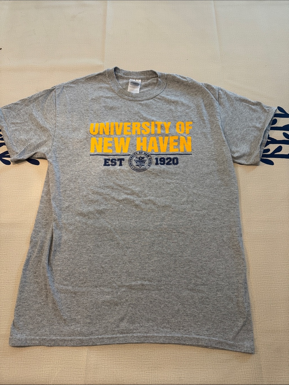 University of New Haven Gray T-Shirt with Yellow University Logo